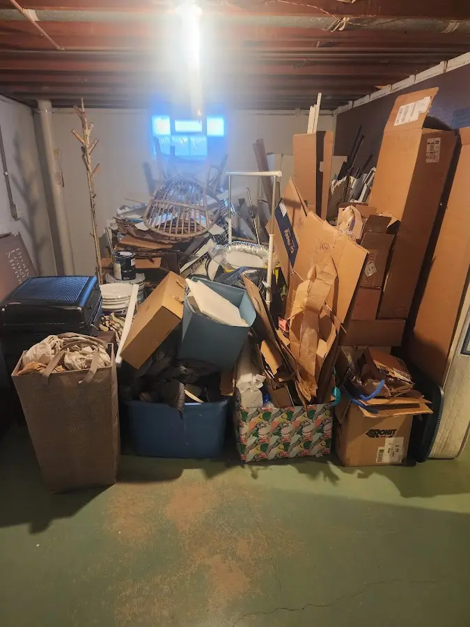 Roll-off dumpster container at job site for Yard Waste Dumpster Rental in Sun City West